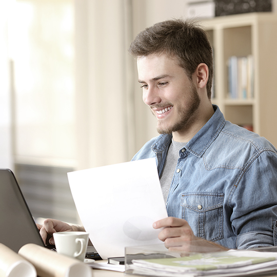 man working with his laptop